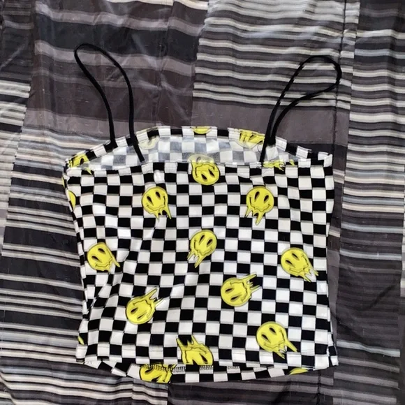Black/white plaid crop too with spaghetti sleeves and drip smiley face pattern. - Picture 2 of 3